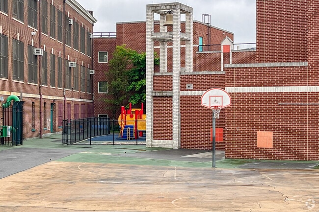 Elementary school students at PS 113 have a separate playground to play during recess.