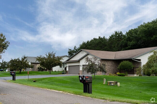 Some homes in Tainter Lake have garages, attached or detached, to provide extra space for residents.