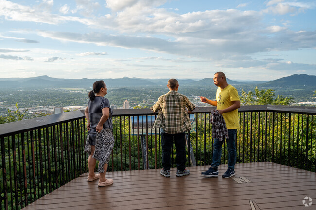 The Great Mill Mountain Overlook offers stunning panoramic views of the valley.