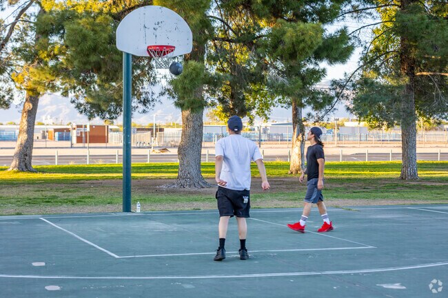 The basketball courts at Rudy Garcia Park near Drexel Park are a hub for friendly competition, where locals gather for impromptu games under the Arizona sun.
