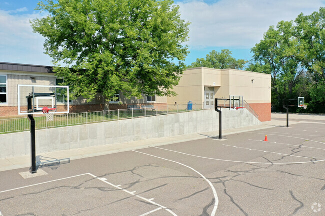 Meadowbrook Elementary School offers multiple basketball hoops for students to use.