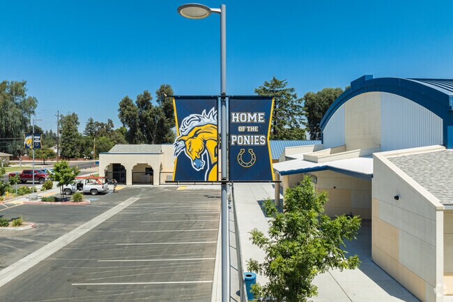 Colorful banners around Laton Elementary School campus feature the school mascot.