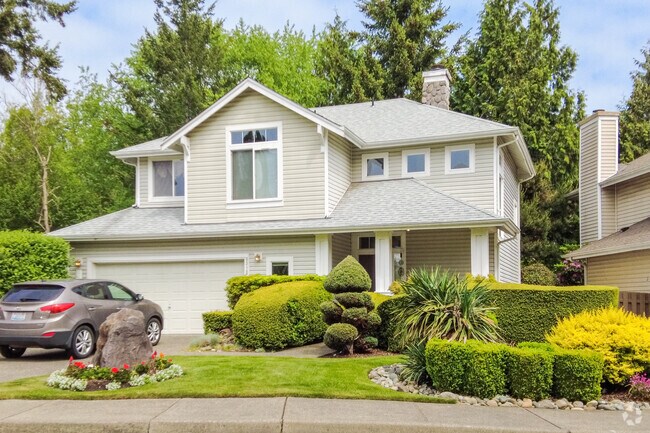 Home with a beautiful garden and yard in the Riverfront neighborhood.