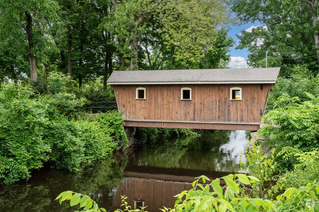Jubilee Park’s covered bridge crosses the Saco River.