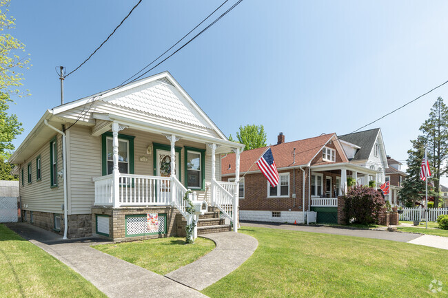 Amboy Road in Tottenville, the main thoroughfare, is dotted with  houses sporting America flags.