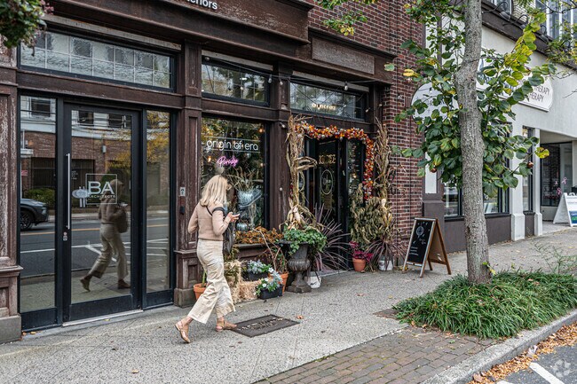 Walk past many stores like Origin of Era in Down Town Bay Shore.