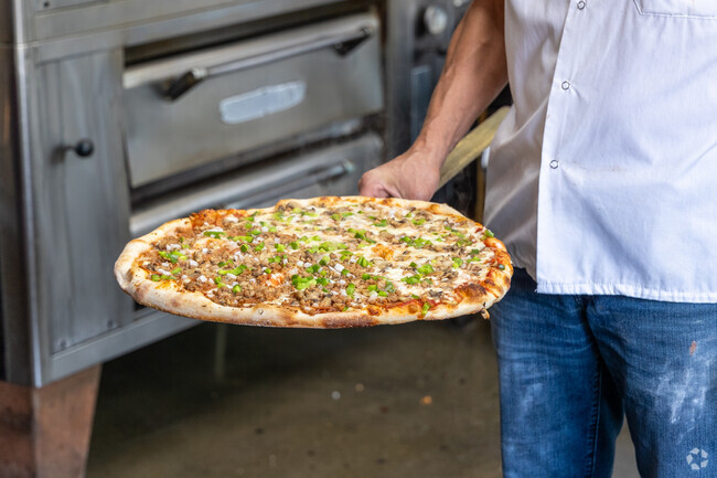 Santa Clara residents enjoy Dayton's favorite pizza.
