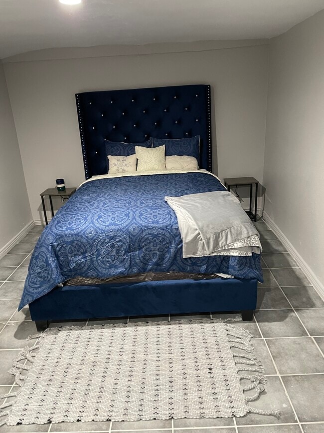 Queen size bed and side tables