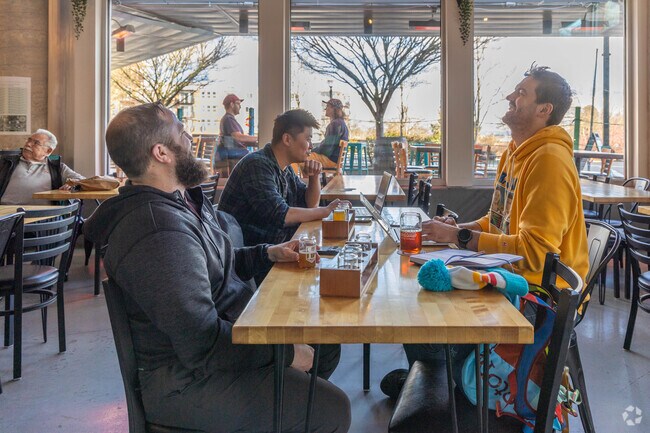 Residents enjoy each other's company at Logan Brewing near Linde Hill Park.