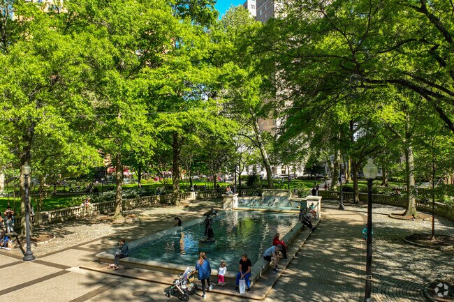 Rittenhouse Square Park attracts locals and visitors in the summer months.