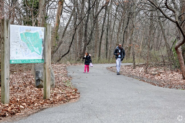 Locals of the Edenwald community enjoying a walk in the park.
