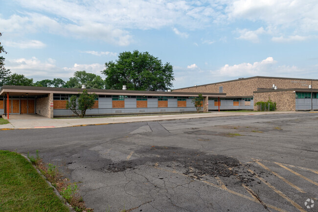 Closed since 2021, the George R. Staley Upper Elementary School has been securely boarded-up.