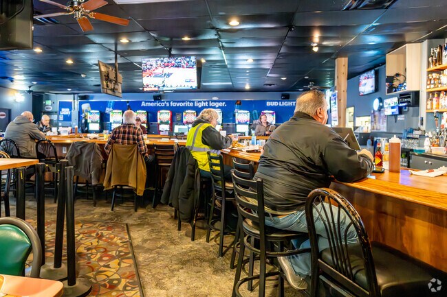 Come to Mikie's Pub in Poplar Grove for great food specials, drinks and fun.