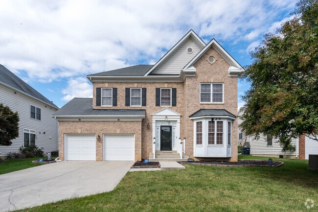 A colonial-style home sits on a long driveway in Shipley Terrace, Washington, D.C.