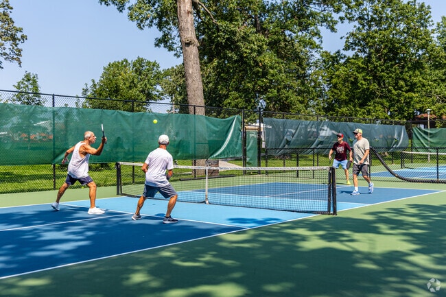 Play some pickleball with friends at Duncan Park, near the Oaks neighborhood.