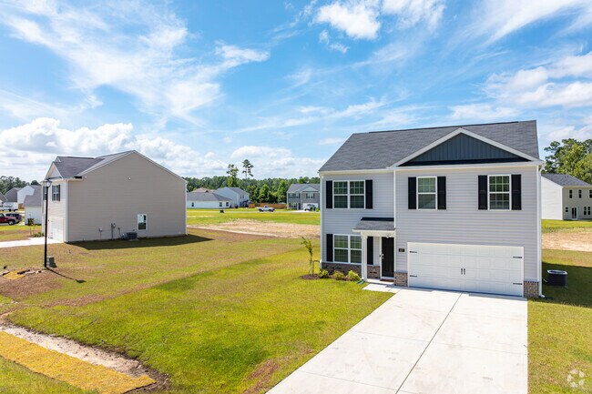 New homes typically sit on quarter‑acre to half‑acre lots here.