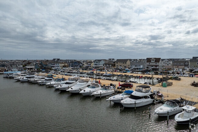 Boaters sail along Barnegat Bay, then dock at Chadwick Island Marina.