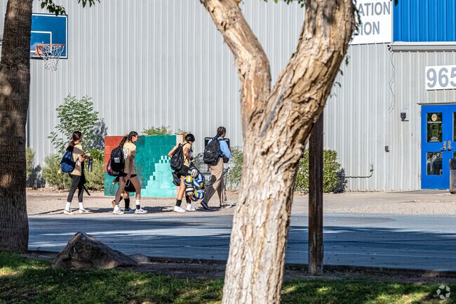 Students arrive to play basketball at the gym at Joe Orduno Park in San Luis, Arizona.