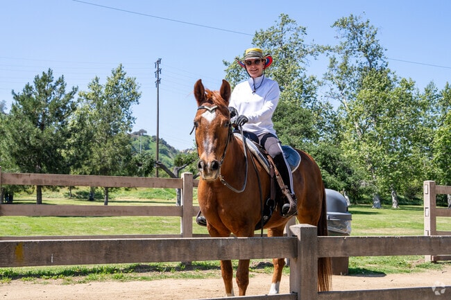 Rancho Riverside provides an ideal backdrop for equestrian activities, where riders can bond with their horses amidst the stunning landscapes and lush greenery.