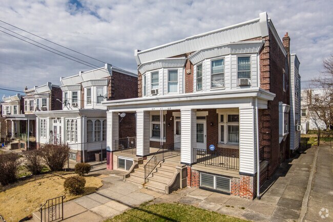 Olney, Philadelphia, PA, has multiple attached townhomes with front porches.