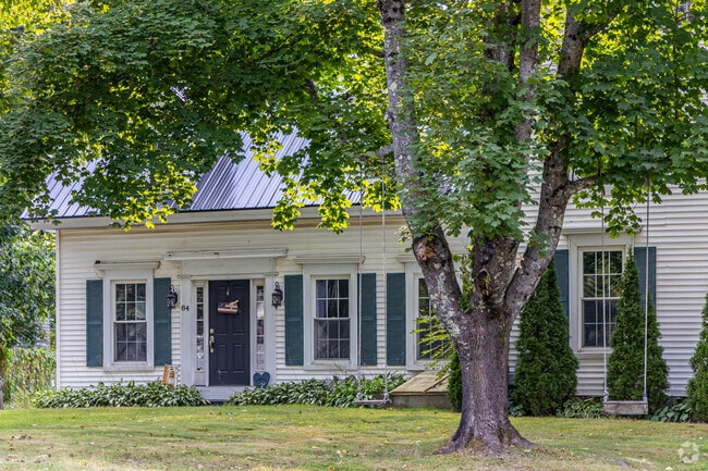 You can find swings outside of colonial homes in Hampden.