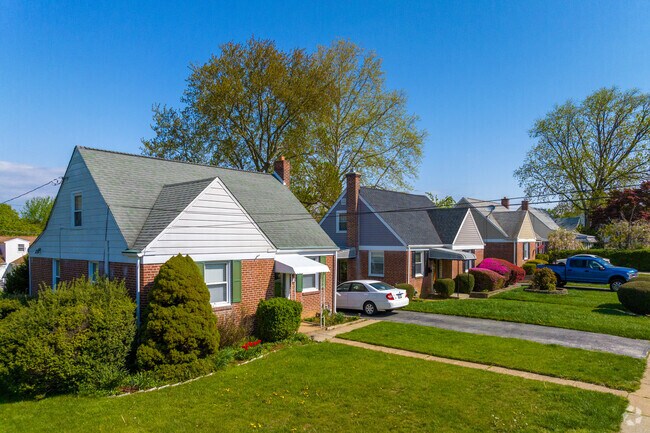 Brick Cape Cod homes in Folsom, PA, add a touch of charm to the neighborhood.
