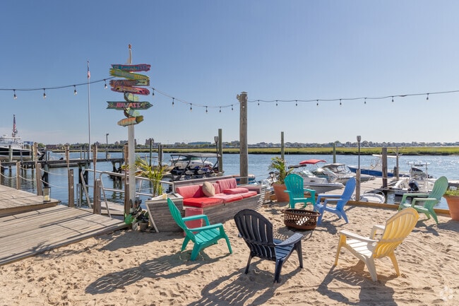 Colorful chairs and world signs will dress Boat House marina in Harbor Isle.