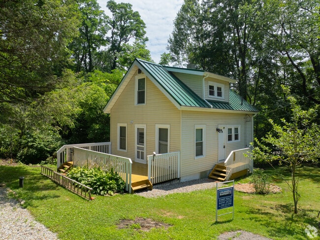 Brady Lake homes are often surrounded by mature oak and pine trees.