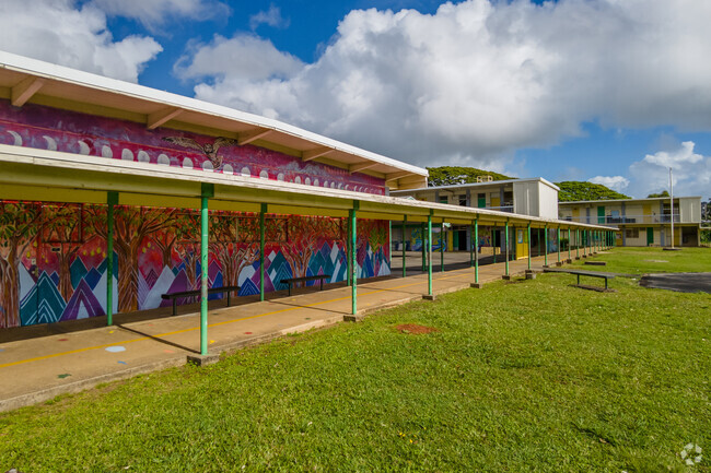 Experience the vibrancy and artistic charm at Puohala Elementary's lush campus.