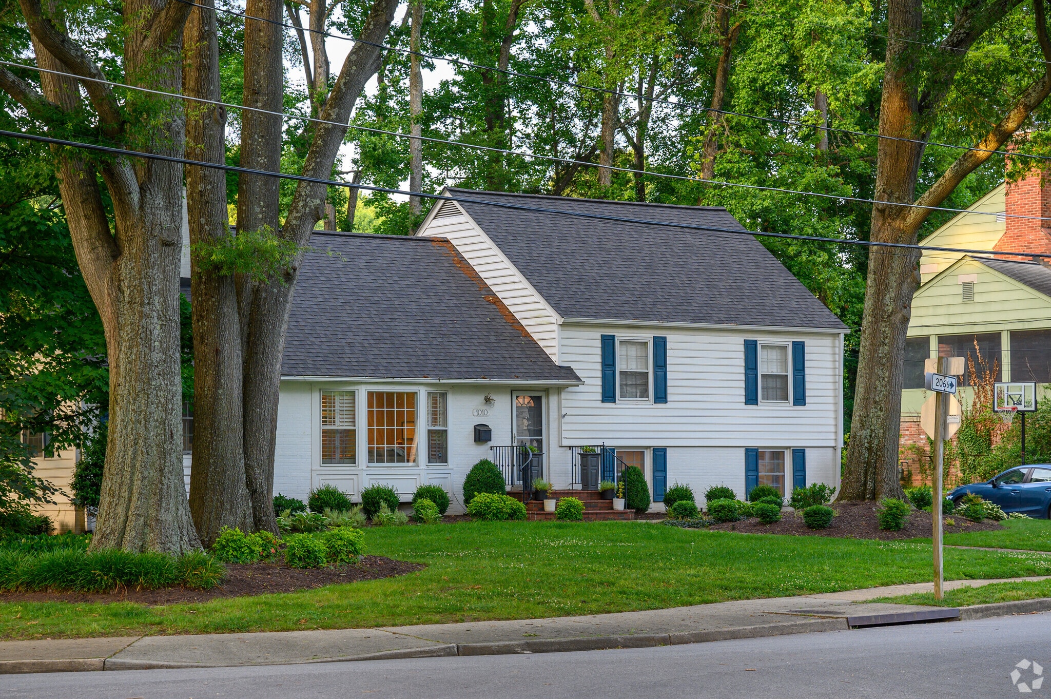 Homes in Fort Hunt are nestled between trees on quiet streets.