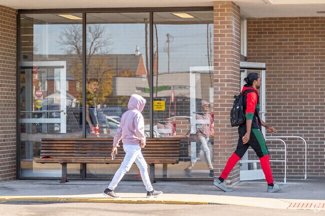 Residents pick up groceries from Butera Market, directly east of the community.