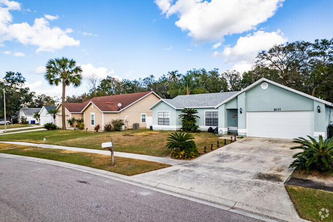 Single-story homes with attached garages in subdivisions of Prairie Lake.