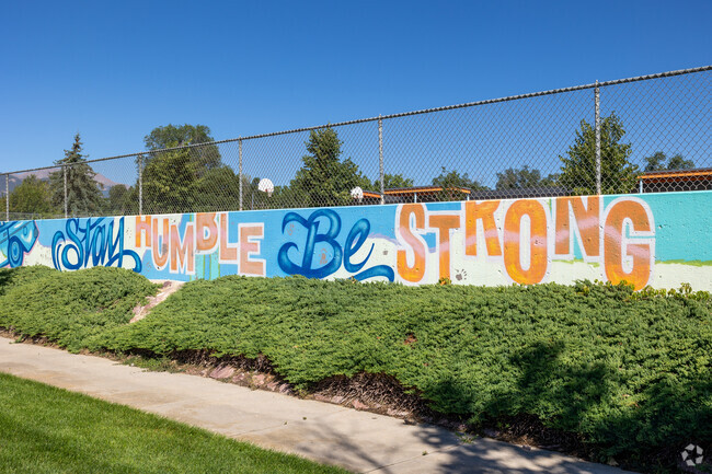 There is a long mural at Adams Elementary.