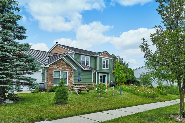 Well-maintained Colonial Revival homes in Liberty Glen often come with attached garages.