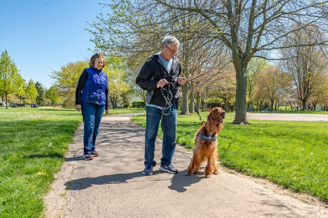 The residents of Tuttle West enjoy spending time with their pets at Ted Kaltenbach Park.