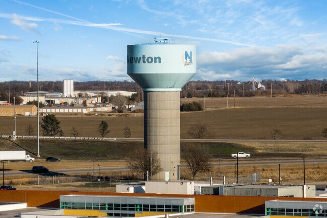 The Newton water tower stands tall over the city.