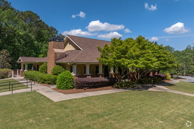 The charming Groomsbridge Clubhouse serves as a vibrant venue for a variety of exciting events, welcoming the residents of Medlock Bridge throughout the year.