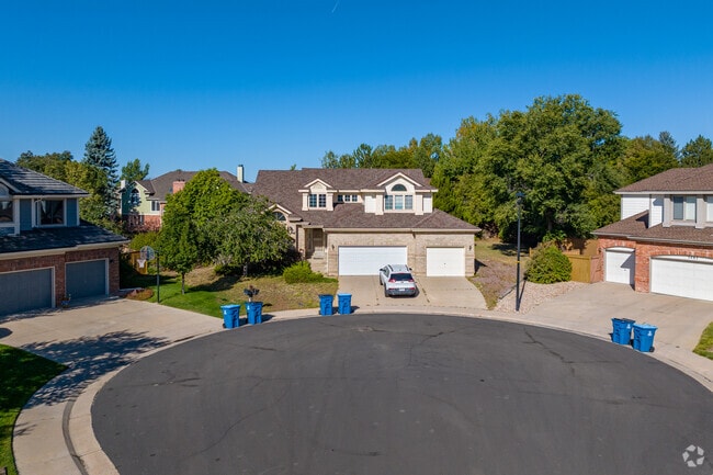 Rows of spacious traditional homes in Piney Creek showcase beautiful variations in brick color.