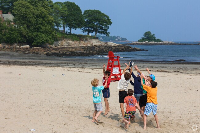 Local kids spend their summers playing on the sun-kissed, sandy shores of the exclusive West Beach in Beverly Farms.