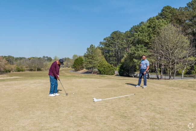 Residents enjoy quality time on the 18-hole Browns Mill Golf Course.