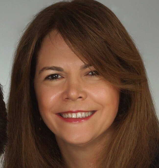 KHRISTINE BRUGGER