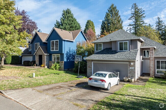 Often streets don’t have sidewalks, reminding visitors of West Portland Park’s pastoral charm.