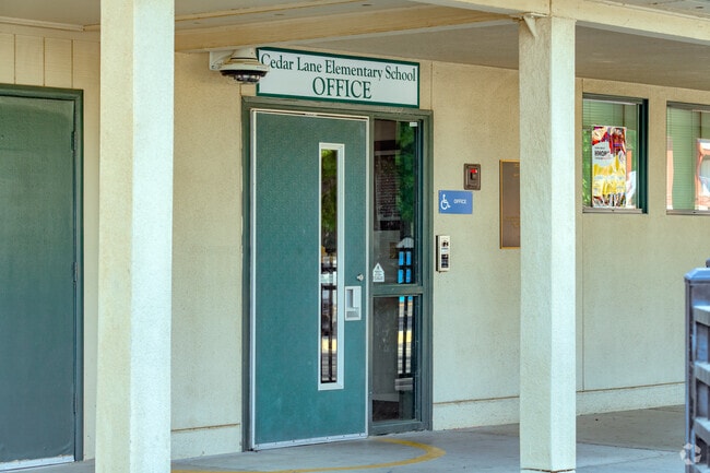 Visitors need to check in at the Cedar Lane Elementary School office.