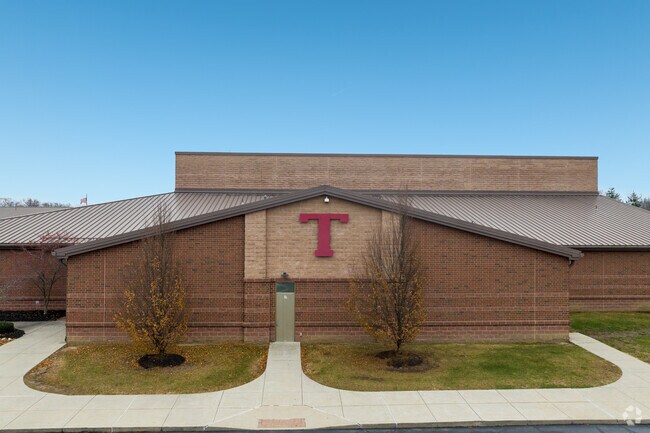 Teachers greet their students with smiles at Tippecanoe High School.