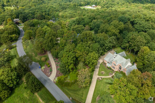 Single homes on large, wooded lots characterize the Sewickley Hills neighborhood.