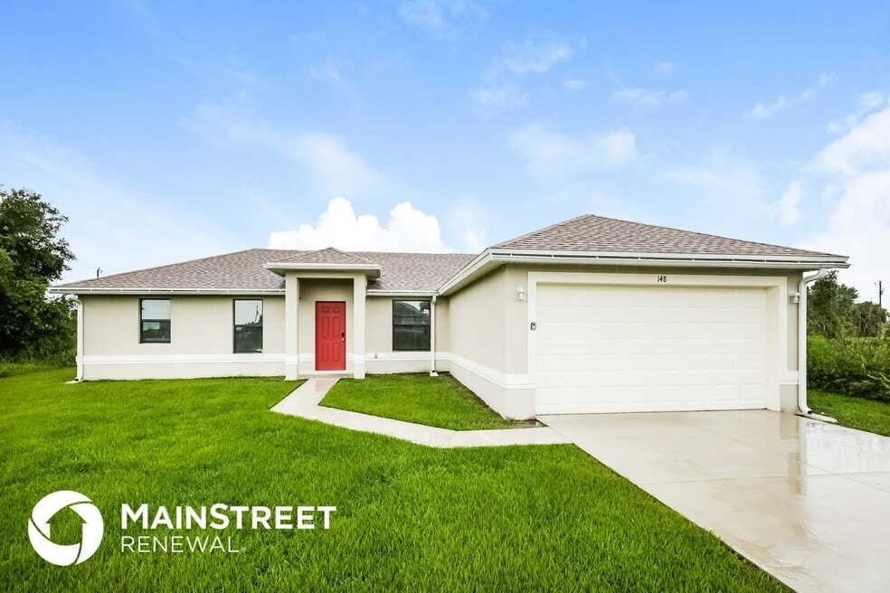 148 Partridge St, Lehigh Acres, FL 33974 - photo 1