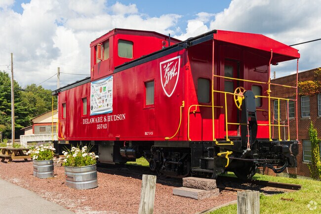 The Old Red Caboose near Foster offers picnic tables and nostalgic charm.