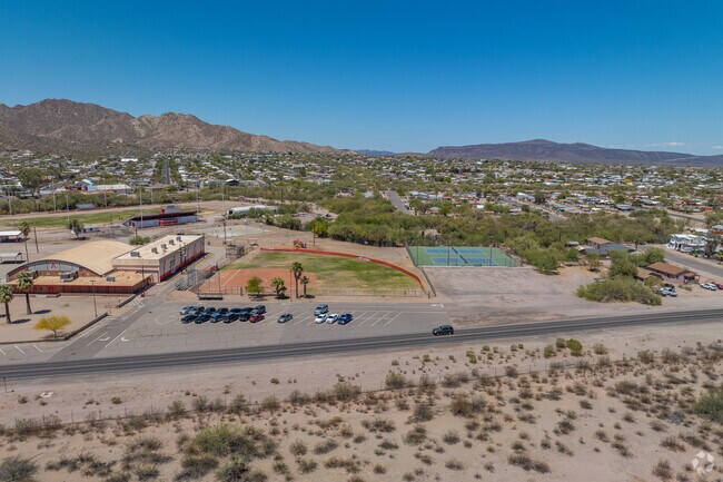 Ajo's school complex includes ports facilities and open space, with desert surroundings visible in every direction.
