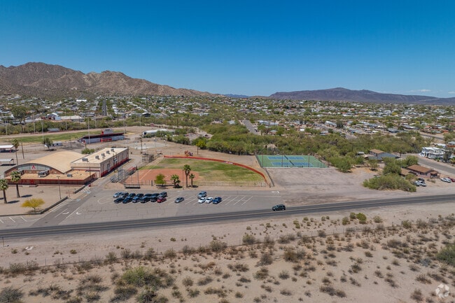 Ajo's school complex includes ports facilities and open space, with desert surroundings visible in every direction.