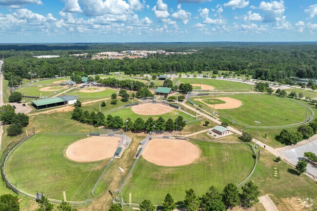 Along with hiking and biking trails in Faulkner Park visitors can also play a game of baseball.
